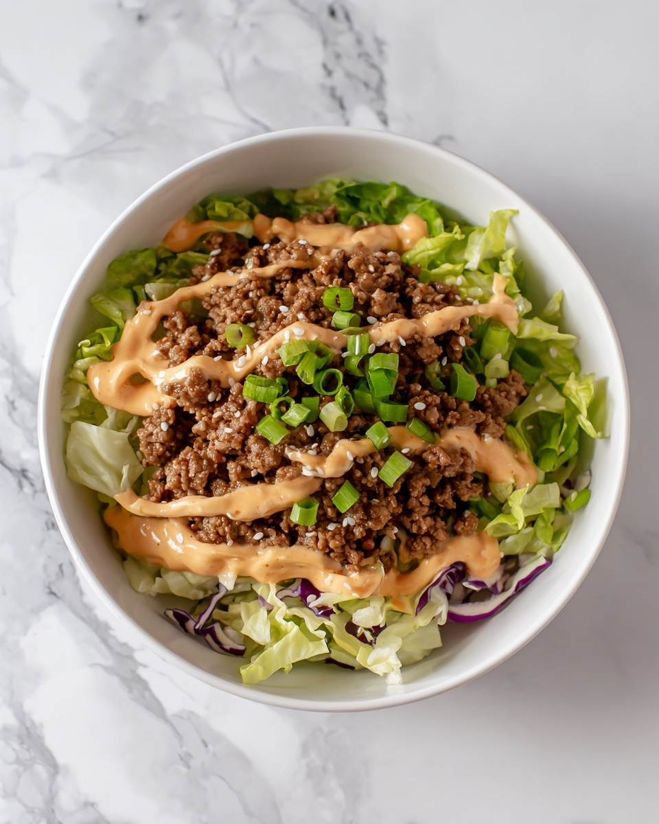 Asian-Inspired Egg Roll in a Bowl with Creamy Chili Sauce Recipe - Recipe Image