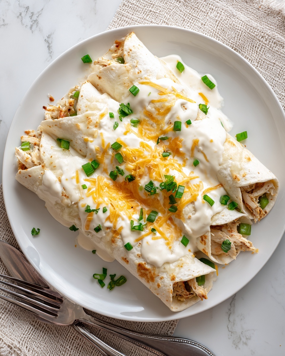 Cheesy Chicken Enchiladas with Creamy Sauce Recipe - Recipe Image
