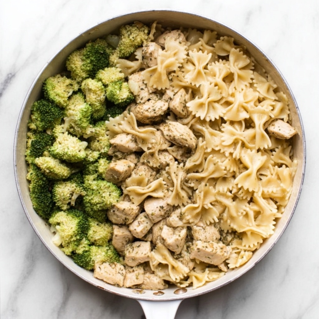 Creamy Pesto Chicken and Broccoli Pasta Bake Recipe - Recipe Image